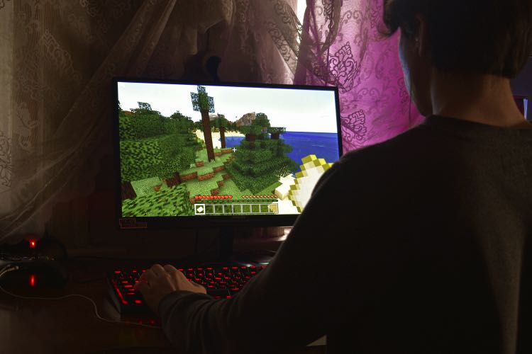 Man at gaming desk