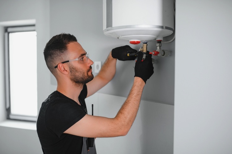 Man fixing boiler