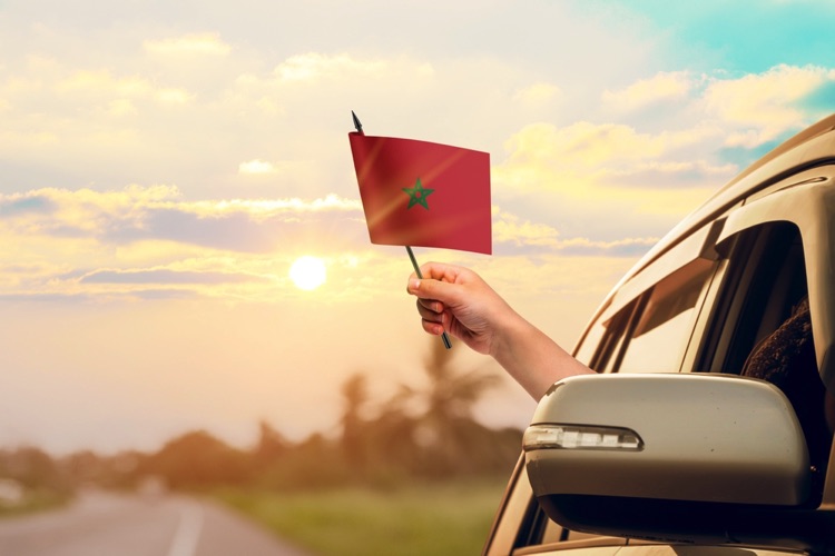 Driving with Morocco flag