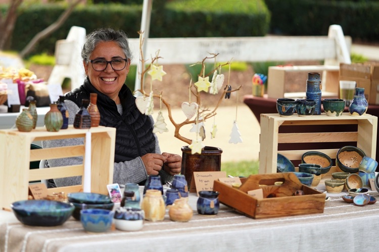 Woman selling homemade ceramics